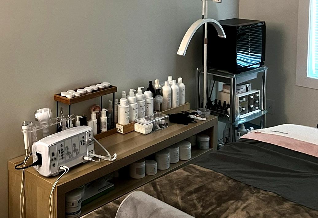 Diamond tip microdermabrasion machine and skincare products in the treatment room at Calming Facials in Issaquah, WA